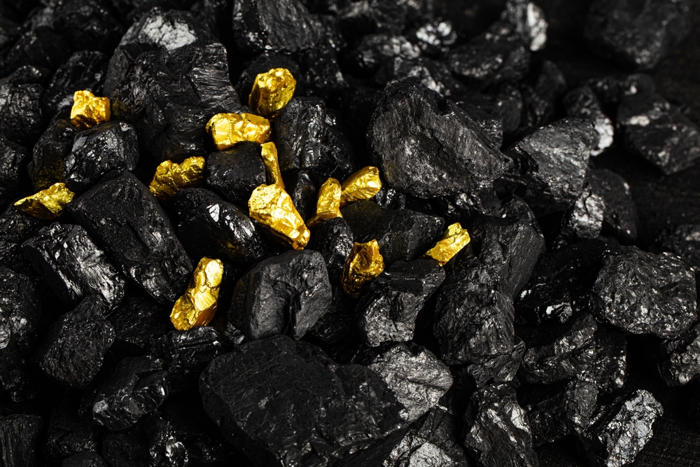 Closeup,Of,Big,Gold,Nugget,Finance,Concept